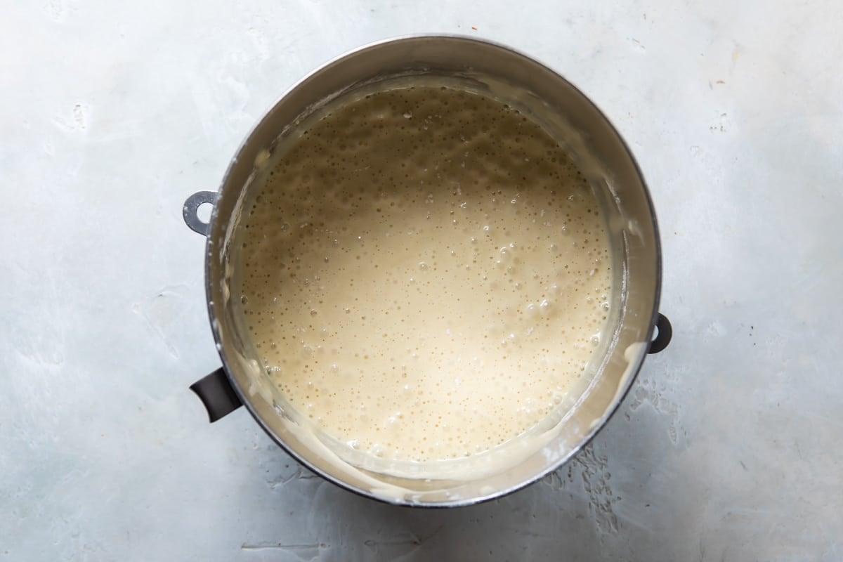 Hot milk cake batter in a mixing bowl.
