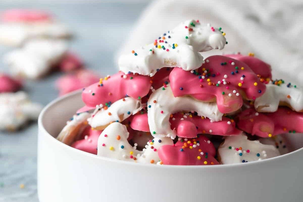 A bowl with homemade circus animal cookies in it.