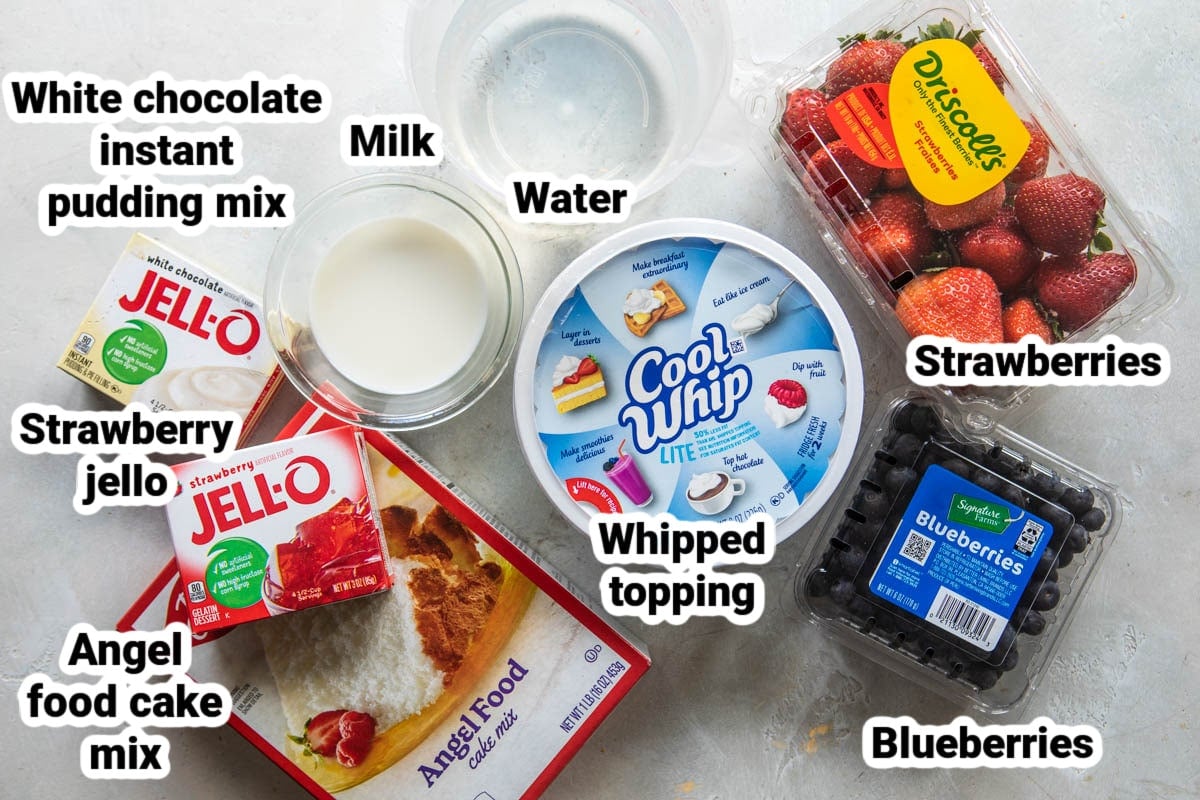 Labeled ingredients for a strawberry jello poke cake.