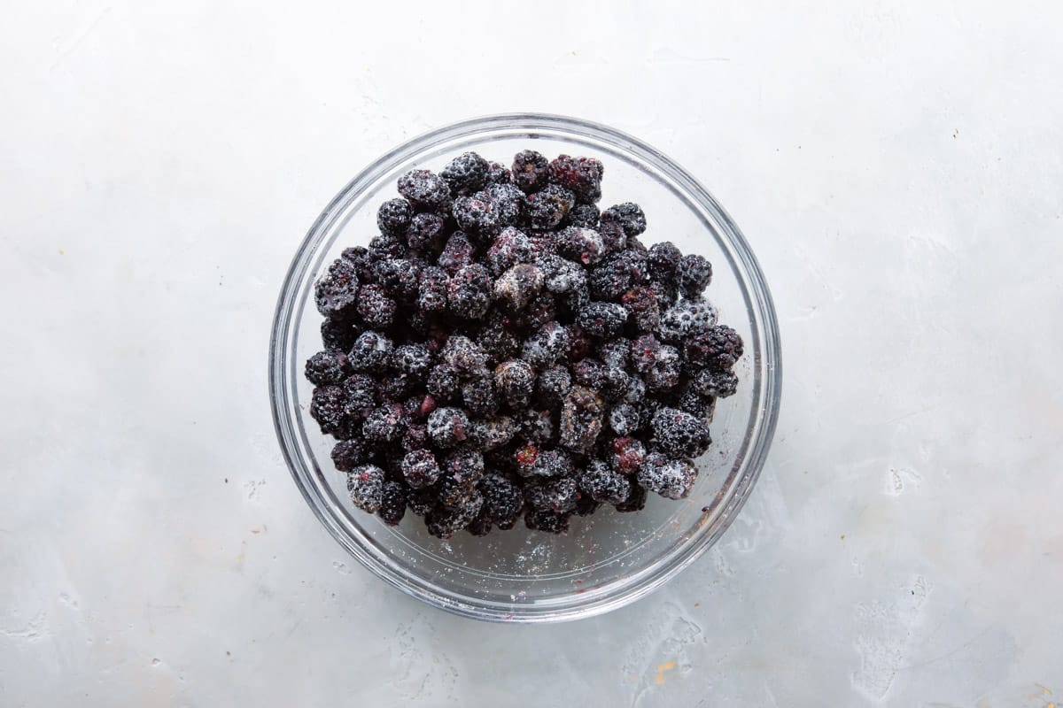 Blackberries in a large glass bowl.