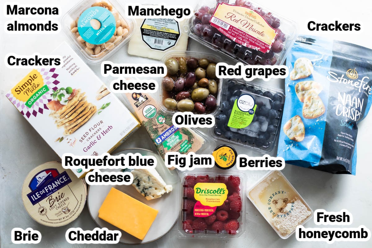 Labeled ingredient suggestions for a cheese board.