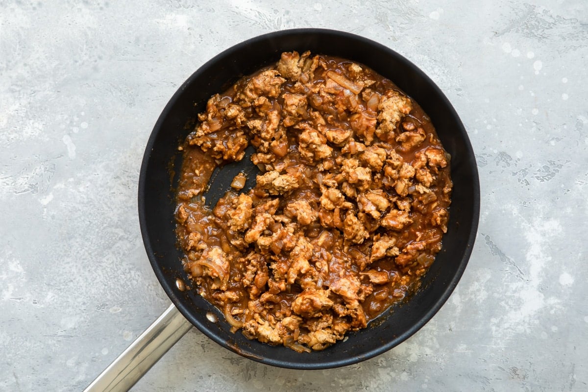 Ground chicken cooked with taco seasoning and tomato sauce.