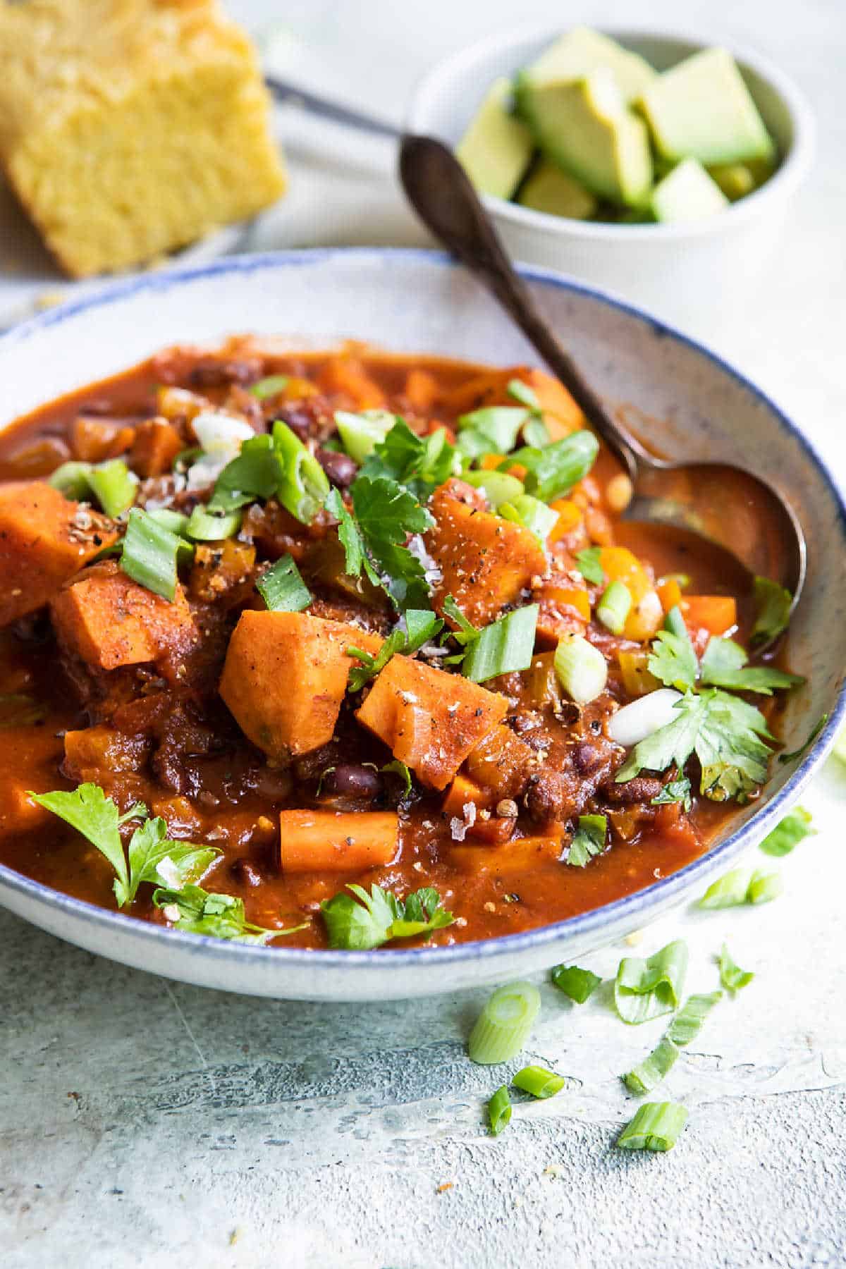 A bowl of sweet potato chili with black beans.