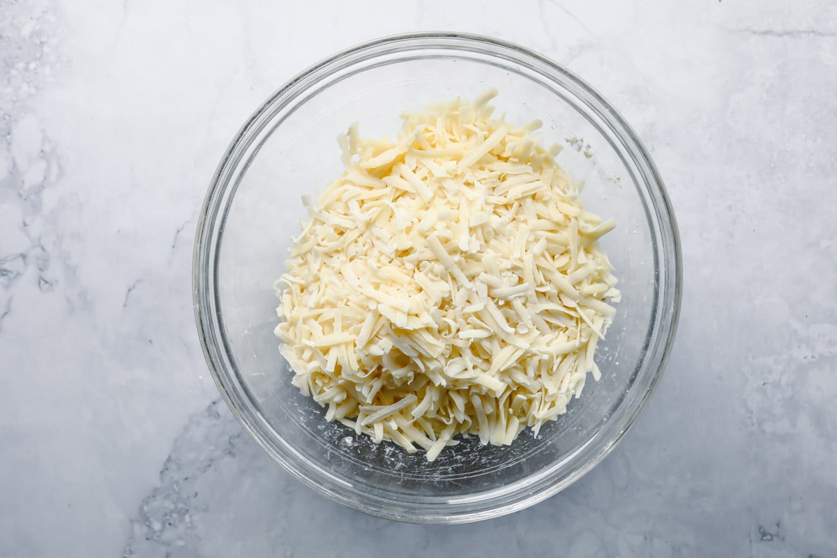 Shredded cheese tossed with cornstarch for fondue.