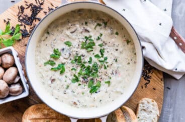 A Dutch oven full of turkey wild rice soup.