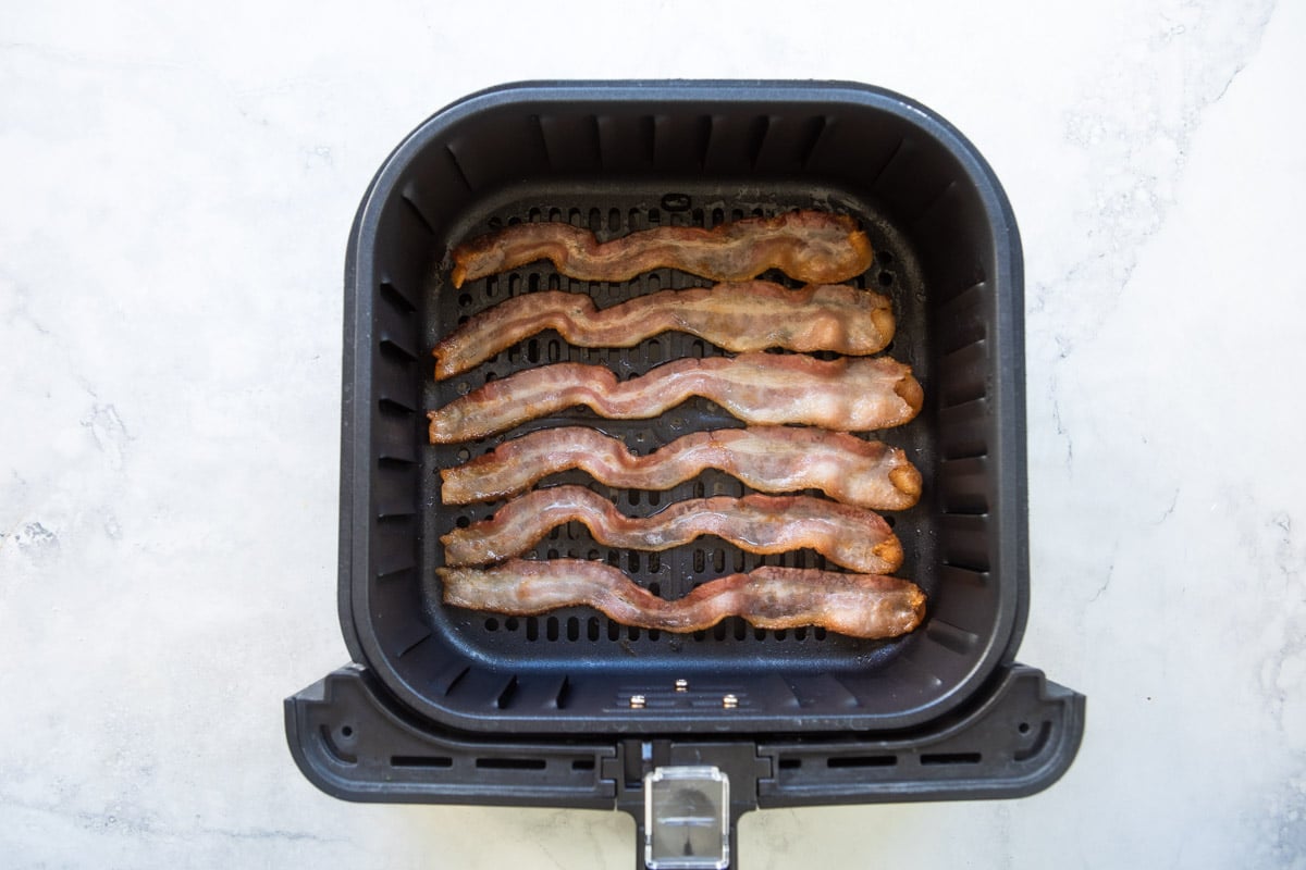 Cooking bacon in an air fryer.
