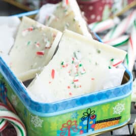 Peppermint bark in a tin on a cooling rack.