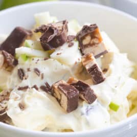 A bowl of snickers salad.
