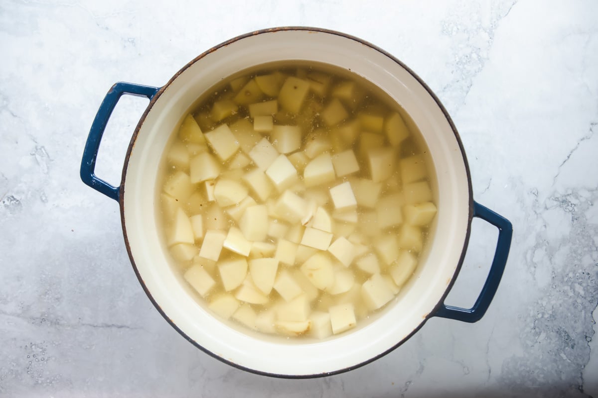 Cubed potatoes in a pot.