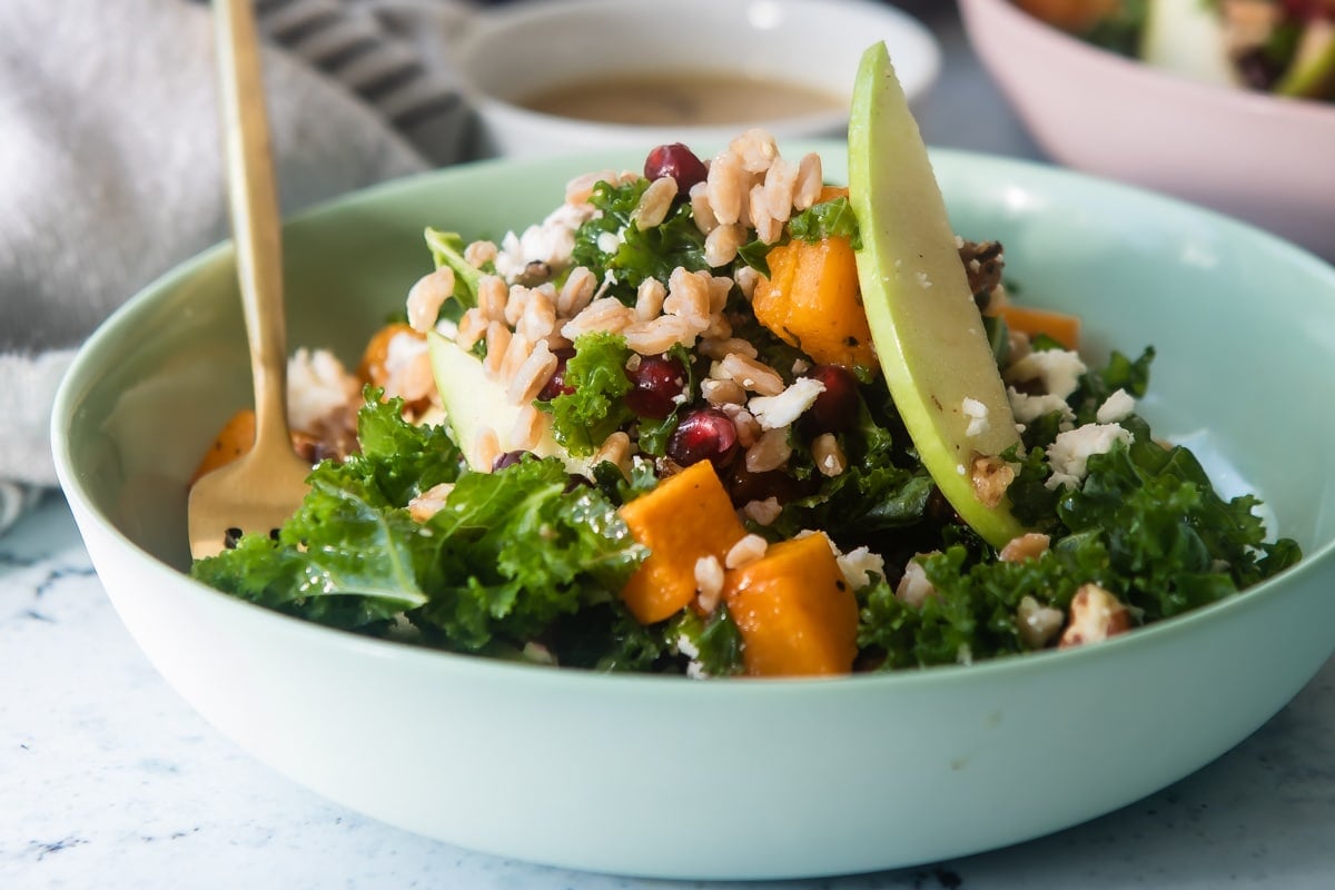 A harvest bowl with farro and kale.