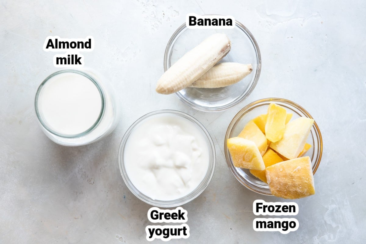 Labeled ingredients for mango smoothies.
