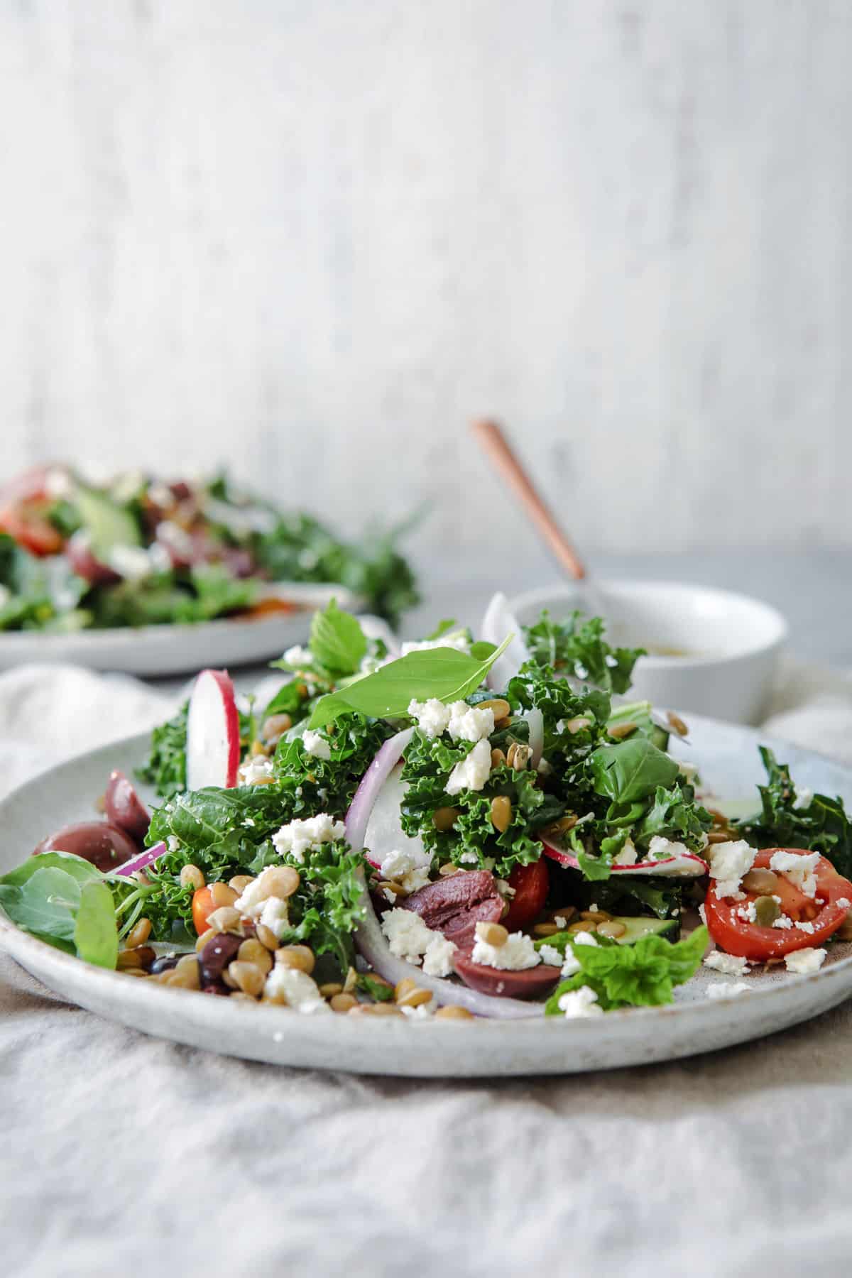 A plate with a serving of Mediterranean Lentil Salad.