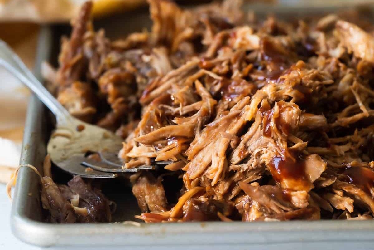 A tray full of bbq pulled pork.