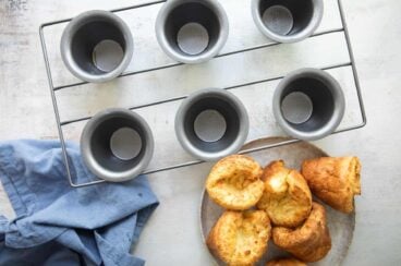 Baked popovers in a popover pan.